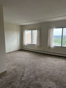 Rowand House living room with lots of natural light and two big windows