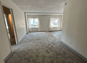 Capital Manor Living Room with Carpet Two Windows